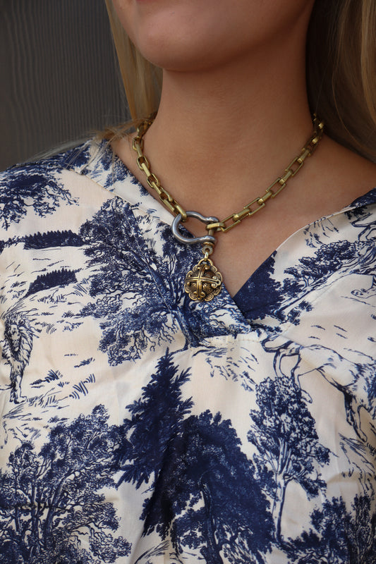 Rounded Gold Cross Necklace
